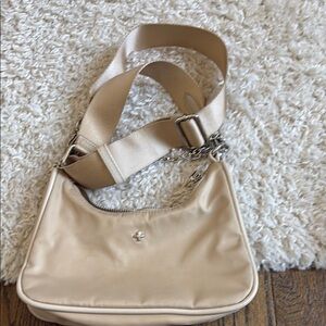 Cream Crescent Shoulder Bag with Silver Hardware